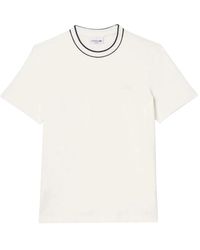 Lacoste - Tops ,Wit ,Katoen Stretch Piqué T-Shirt Met Gestreepte Kraag - Lyst