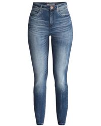 Guess - Skinny-fit jeans carrie mid label-patch - Lyst