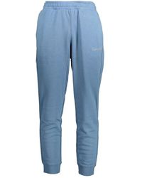 Calvin Klein - Broeken ,Blauw ,Blauwe Sportieve Elastische Taillebroek - Lyst