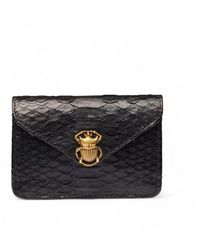 Claris Virot - Porta carte in pelle di pitone nera - Lyst