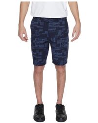 Armani Exchange - Shorts in cotone blu con zip - Lyst