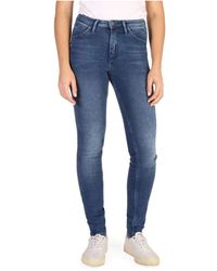 Calvin Klein - Skinny jeans mit logo-detail - Lyst