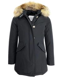 Woolrich - Abrigo acolchado negro con capucha de piel desmontable - Lyst