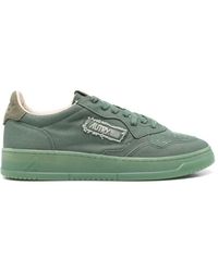 Autry - Grüne schnürschuhe mit perforierter zehenkappe - Lyst