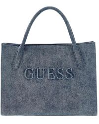 Guess - Handbags - Lyst