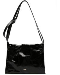 Jil Sander - Shoulder bags,schwarze leder-schultertasche mit kontrast-logo - Lyst