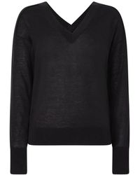 Calvin Klein - Jersey negro de lyocell y lana con cuello en v - Lyst