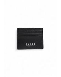 Guess - Schwarzes lederportemonnaie mit innentaschen - Lyst