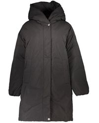 Tommy Hilfiger - Giacca nera in poliestere con cappuccio - Lyst