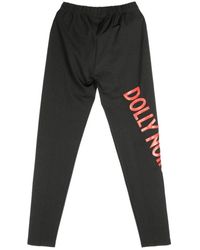 DOLLY NOIRE - Rot Schwarz Logo Leggings Damen - Lyst