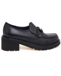 Calpierre - Pumps - Lyst