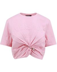 Versace - Rosa t-shirt mit rundhalsausschnitt und logo-print - Lyst