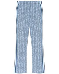 Lacoste - Broeken ,Blauw ,Katoen Flared Monogram Trainingsbroek - Lyst