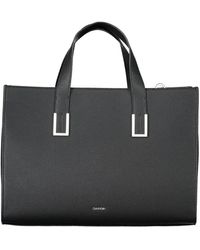 Calvin Klein - Schwarze polyester-handtasche mit verstellbarem riemen - Lyst
