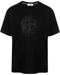 Stone Island - T-shirt e polo nere per uomo - Lyst