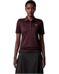Lacoste - Tops ,Bruin ,Polyester Slim Fit Uv Protect Stretch Golf Polo - Lyst