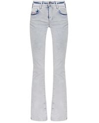 DIESEL - Flared Jeans - Lyst