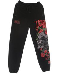 DOLLY NOIRE - Rote Leichte Trainingshose - Lyst