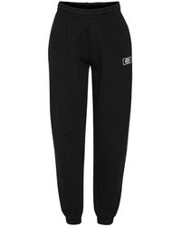 ROTATE BIRGER CHRISTENSEN - Pantalón de jogging negro con cintura elástica y logo bordado - Lyst