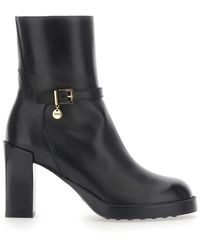 Tod's - Schoenen ,Zwart ,Leer Enkellaarzen Met Rubberen Zool En 5 Cm Hak Zwart - Lyst