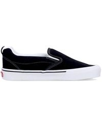 Vans - Slip-on low top schwarz/weiß sneakers - Lyst