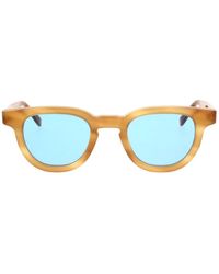 Retrosuperfuture - Stylische sonnenbrille mit bernsteinfarbenem rahmen und blauen gläsern - Lyst