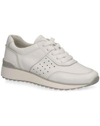 Caprice - Sneakers in pelle bianca per donne - Lyst