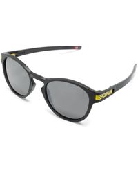 Oakley - Occhiali da sole neri ovali lenti grigie - Lyst