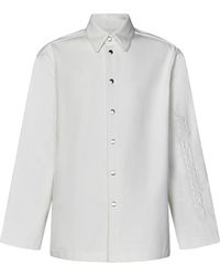 Jil Sander - Baumwollhemd mit ton-in-ton-druck,weiße hemdbluse mit knopfleiste und logo-detail - Lyst