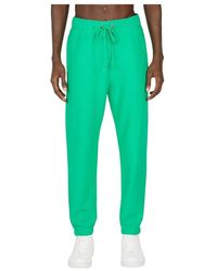 Champion - Broeken ,Groen ,Katoen Elastische Trainingsbroek Met Manchetten - Lyst