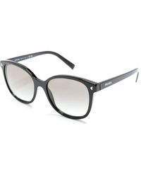 Prada - Schwarze sonnenbrille mit original-etui - Lyst