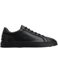 Tod's - Schwarze ledersneakers mit gummisohle,sneaker mit schnürung,schwarze ledersneakers runde zehe logo - Lyst