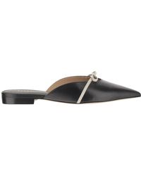 Ferragamo - Kid-leder-bogen-mules schwarz weiß - Lyst