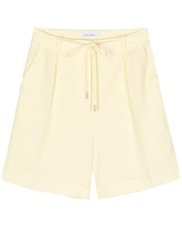 Calvin Klein - Mimosa gialli pantaloncini twill - Lyst