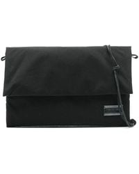 Our Legacy - Schwarze foldover bum bag mit logo patch - Lyst