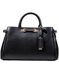 Guess - Handbags - Lyst