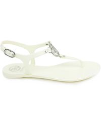 Guess - Flat Sandals - Lyst