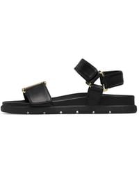 Loriblu - Schoenen ,Zwart ,Leer Platte Nappa Leren Sandalen Met Logo-Gesp - Lyst