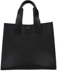 Quira - Bags > tote bags - Lyst