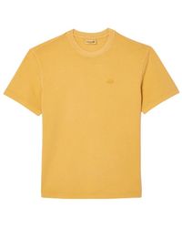Lacoste - Gelbes t-shirt mit einzigartigem stil - Lyst