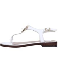 Guess - Flat Sandals - Lyst