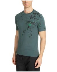 Moschino - Gemustertes mehrfarbiges t-shirt mit logo - Lyst
