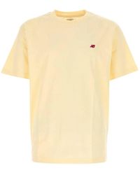 New Balance - Tops ,Geel ,Katoen Klassiek Katoenen T-Shirt - Lyst