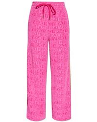 Versace - Broeken ,Roze ,I Baroque Flared Trainingsbroek - Lyst