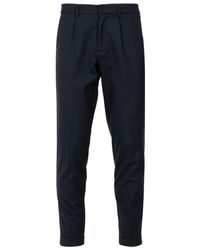 Cruna - Broeken ,Blauw ,Wol Blauwe Wollen Broek Tapered Fit - Lyst
