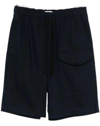 Studio Nicholson - Korte Broeken ,Blauw ,Katoen Ikaria Short - Lyst