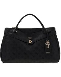 Guess - Handbags - Lyst