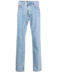 Martine Rose - Straight-leg jeans mit streifen und ausgeblichenem schriftzug - Lyst