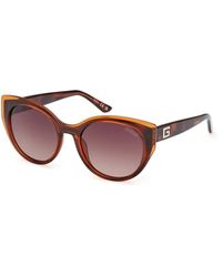 Guess - Ultimo modello occhiali da sole in marrone con lenti a gradiente - Lyst