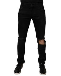 Dolce & Gabbana - Schwarze Zerrissene Skinny Denim Jeans Mit Logo - Lyst